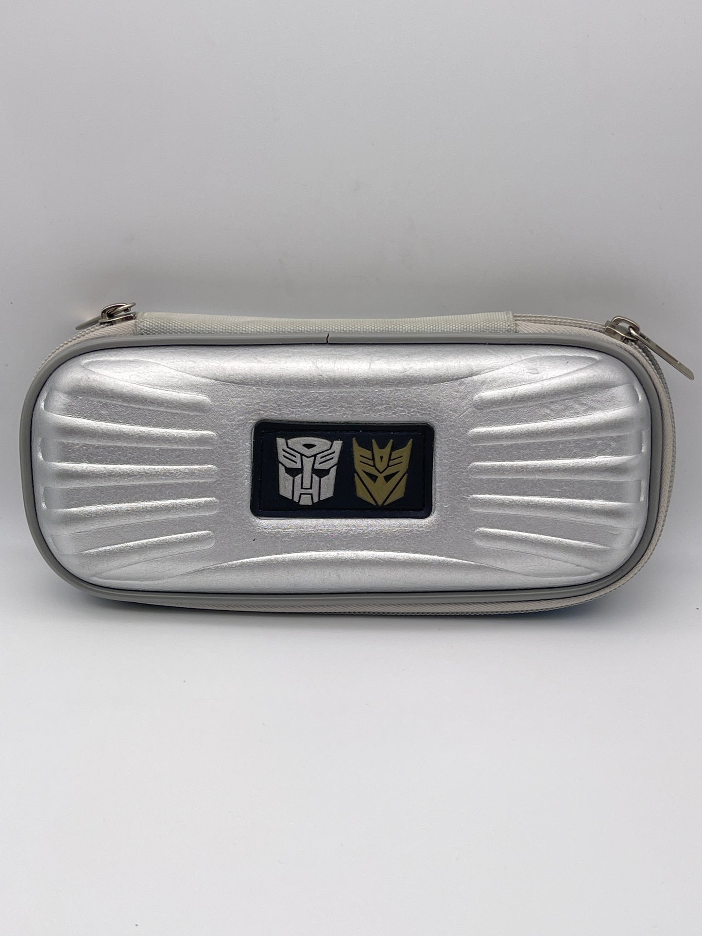 L81100036 กล่องดินสอ Transformers สีเงิน